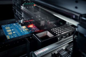 Close-up of a high-resolution X-ray electronic inspection machine, featuring a blue PCB with intricate gold patterns and glowing red lights, evoking precision.