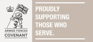Armed Forces Covenant emblem shows a crowned lion holding a Union Jack beside the bold message, “Proudly supporting those who serve.”