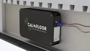 calmfloor beam mount product. device is mounted on an aluminium wall